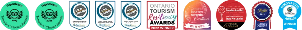 Collection of awards and badges earned by Udderly Ridiculous Farm Life, including recognition in the top 10% of attractions worldwide.